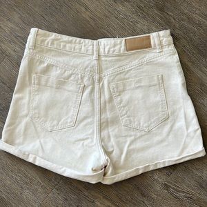 Zara creamed colored shorts with gold buttons